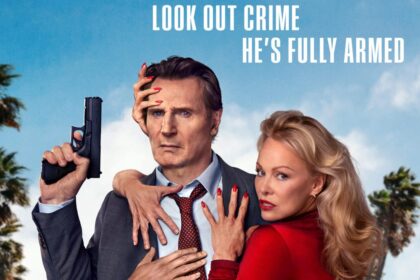 Liam Neeson with a serious expression, holding a handgun, while a woman with red nail polish (Pamela Anderson) embraces him from behind, set against a blue sky with palm trees.