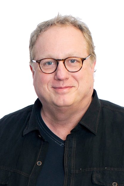 A headshot of Joel McNeely.