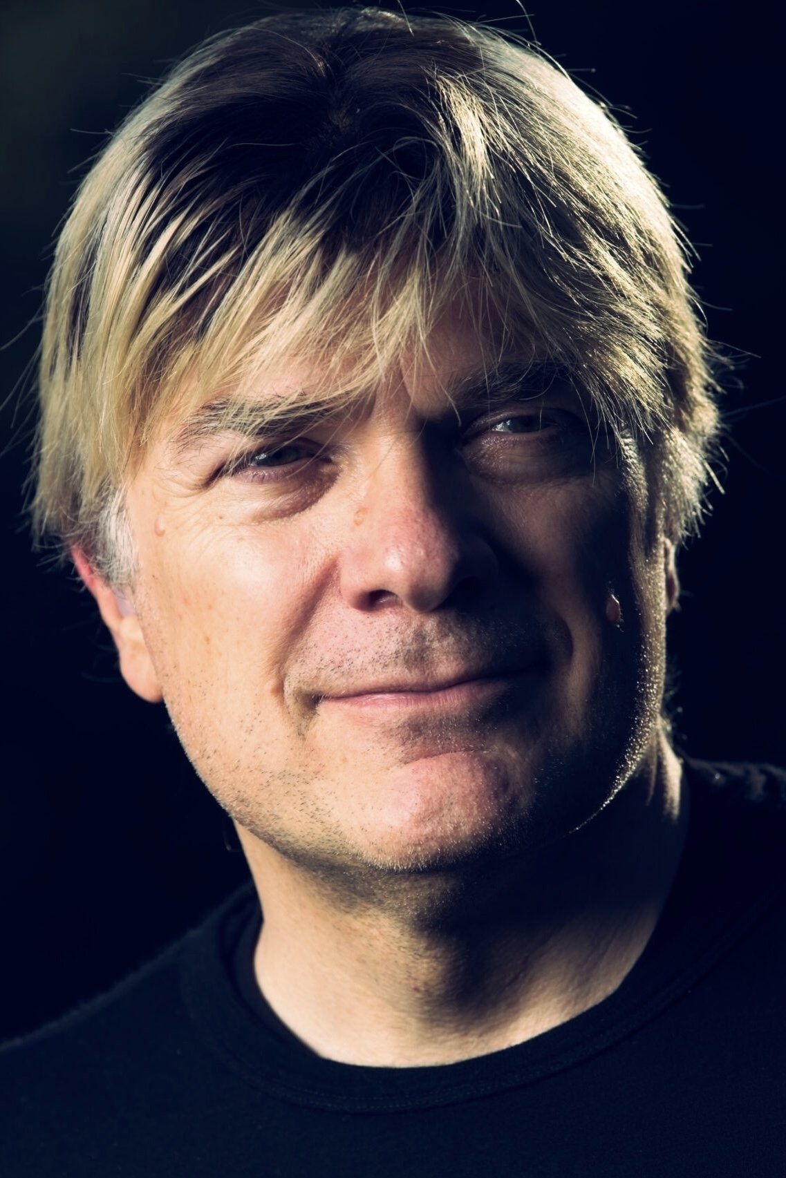 A headshot of Simon Franglen.