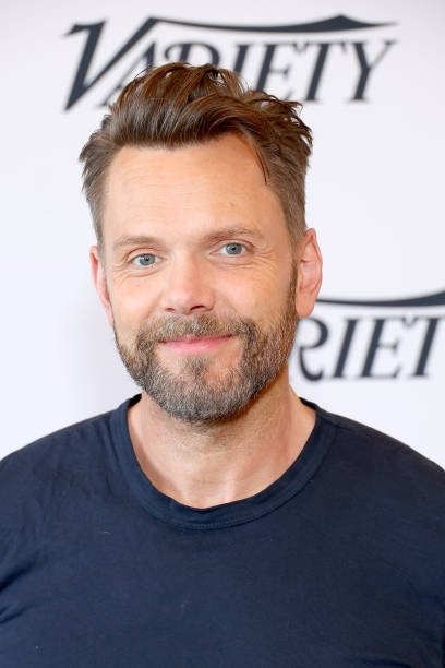 A headshot of Joel McHale.