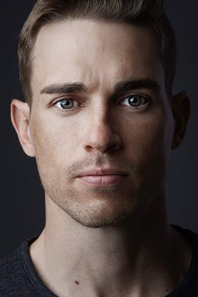 A headshot of DeVille Vannik.