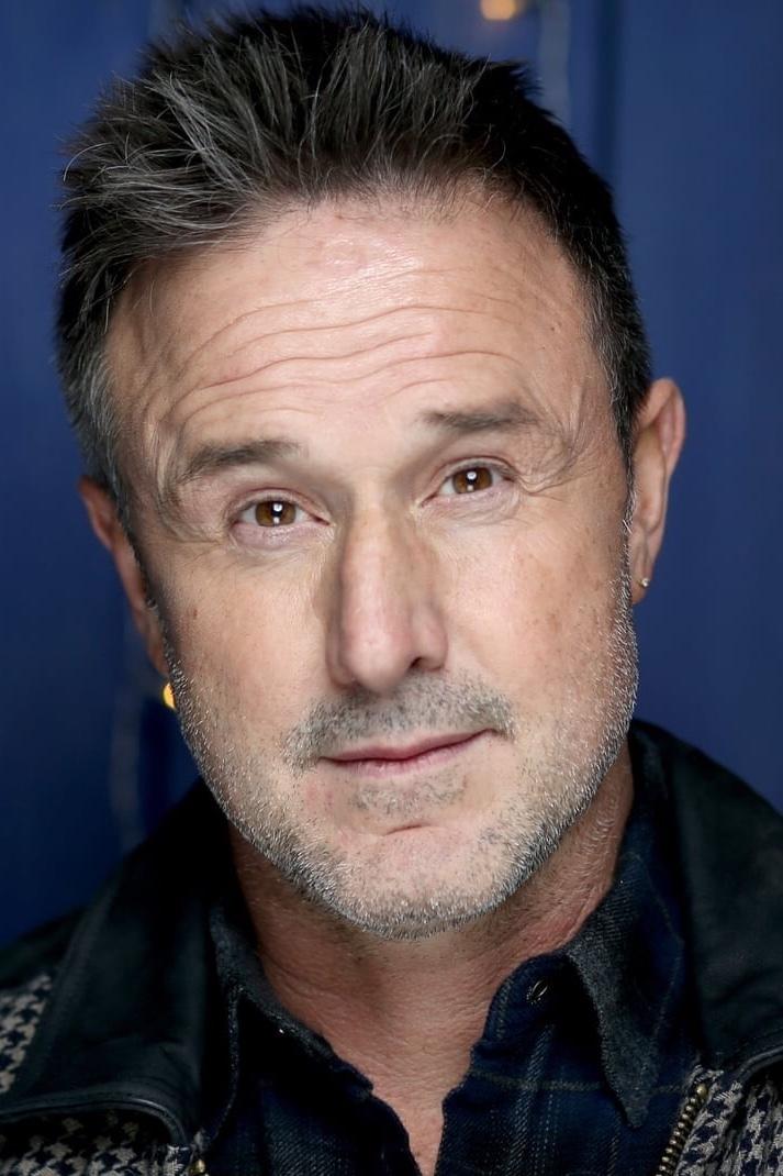 A headshot of David Arquette.