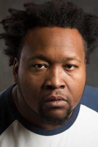 A headshot of Adrian McLean.