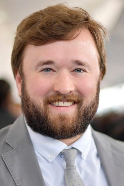 A headshot of Haley Joel Osment.