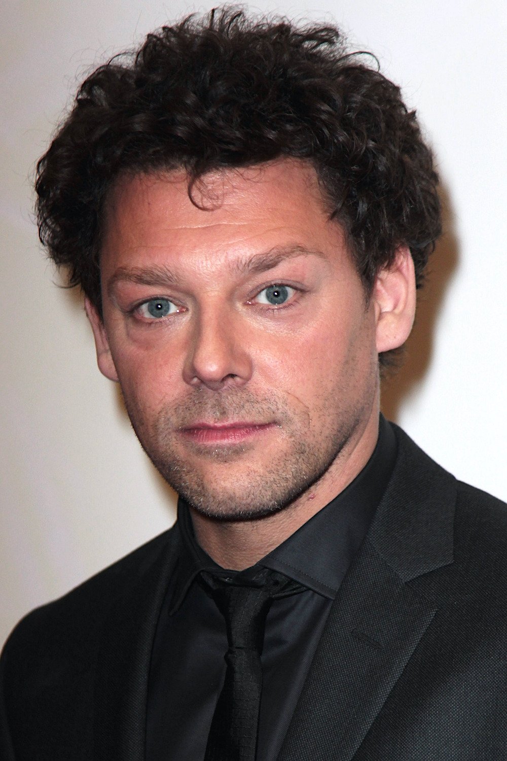 A headshot of Richard Coyle.