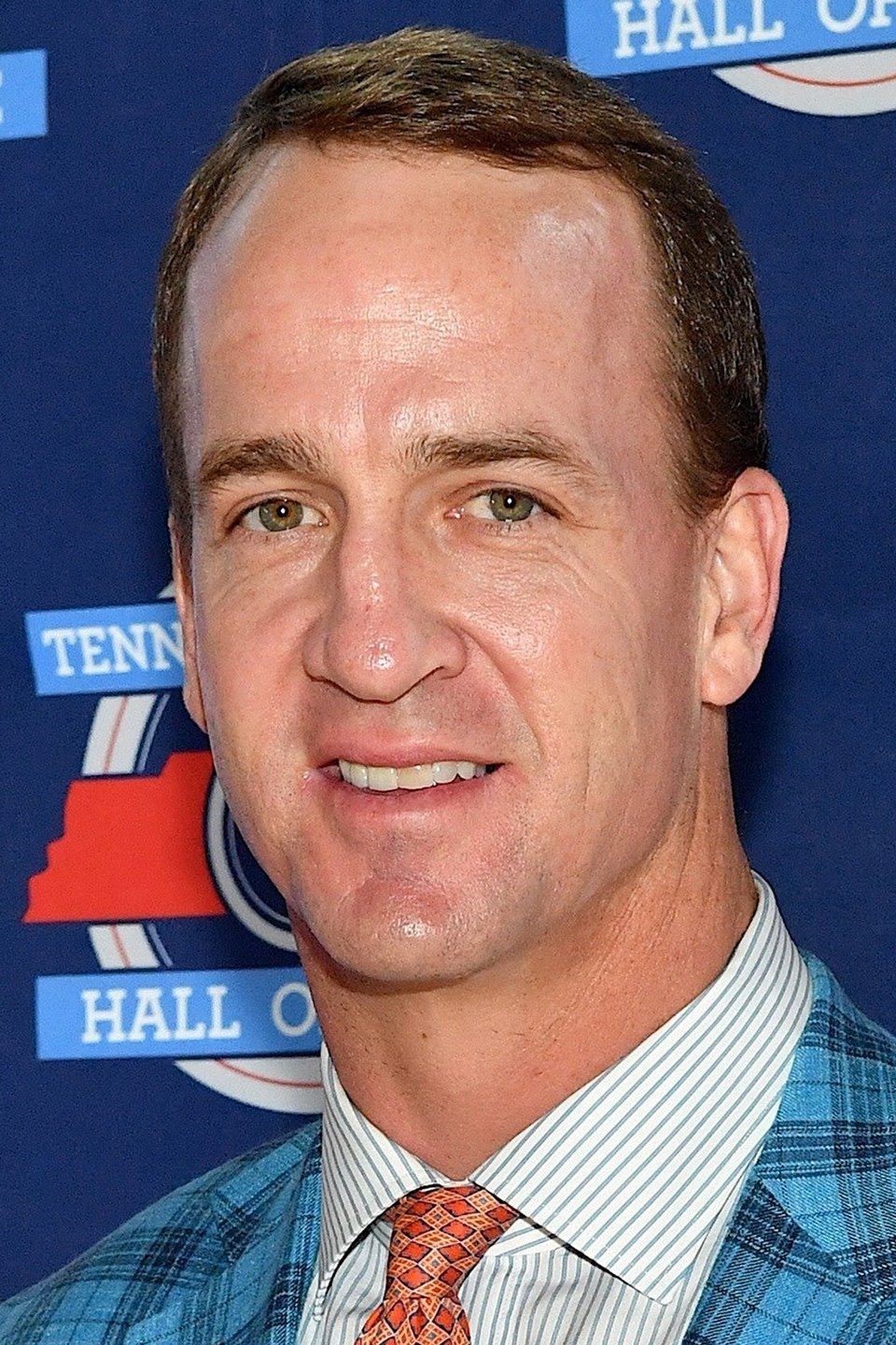 A headshot of Peyton Manning.