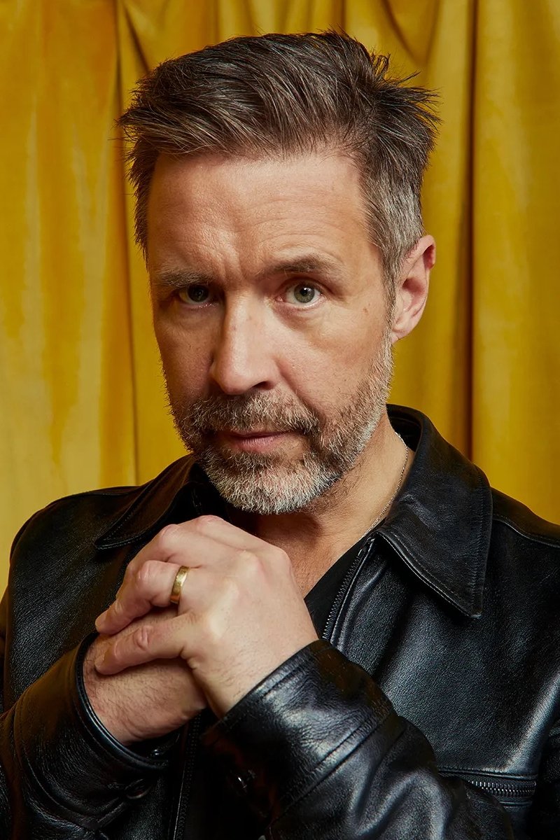 A headshot of Paddy Considine.