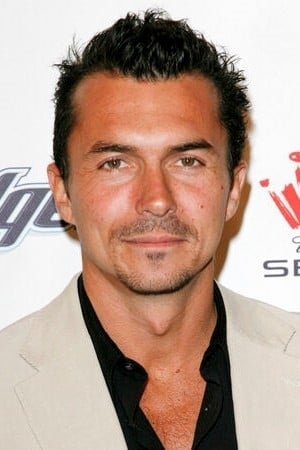 A headshot of William Abadie.