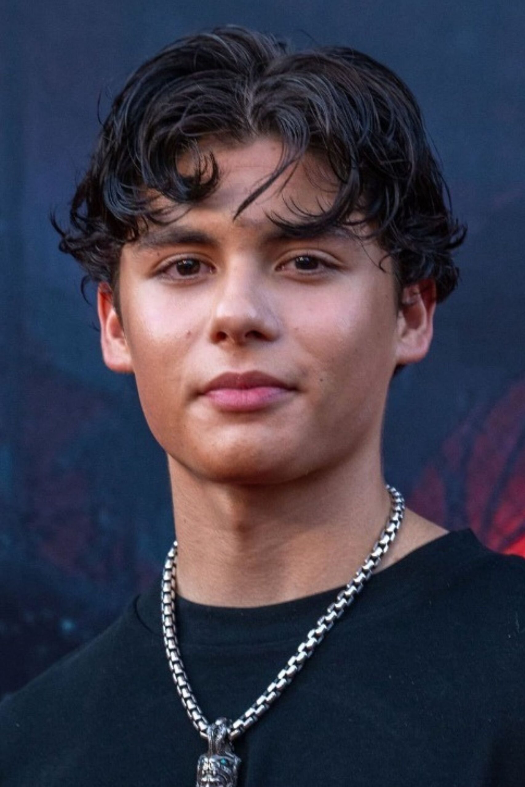 A headshot of Miguel Mora.