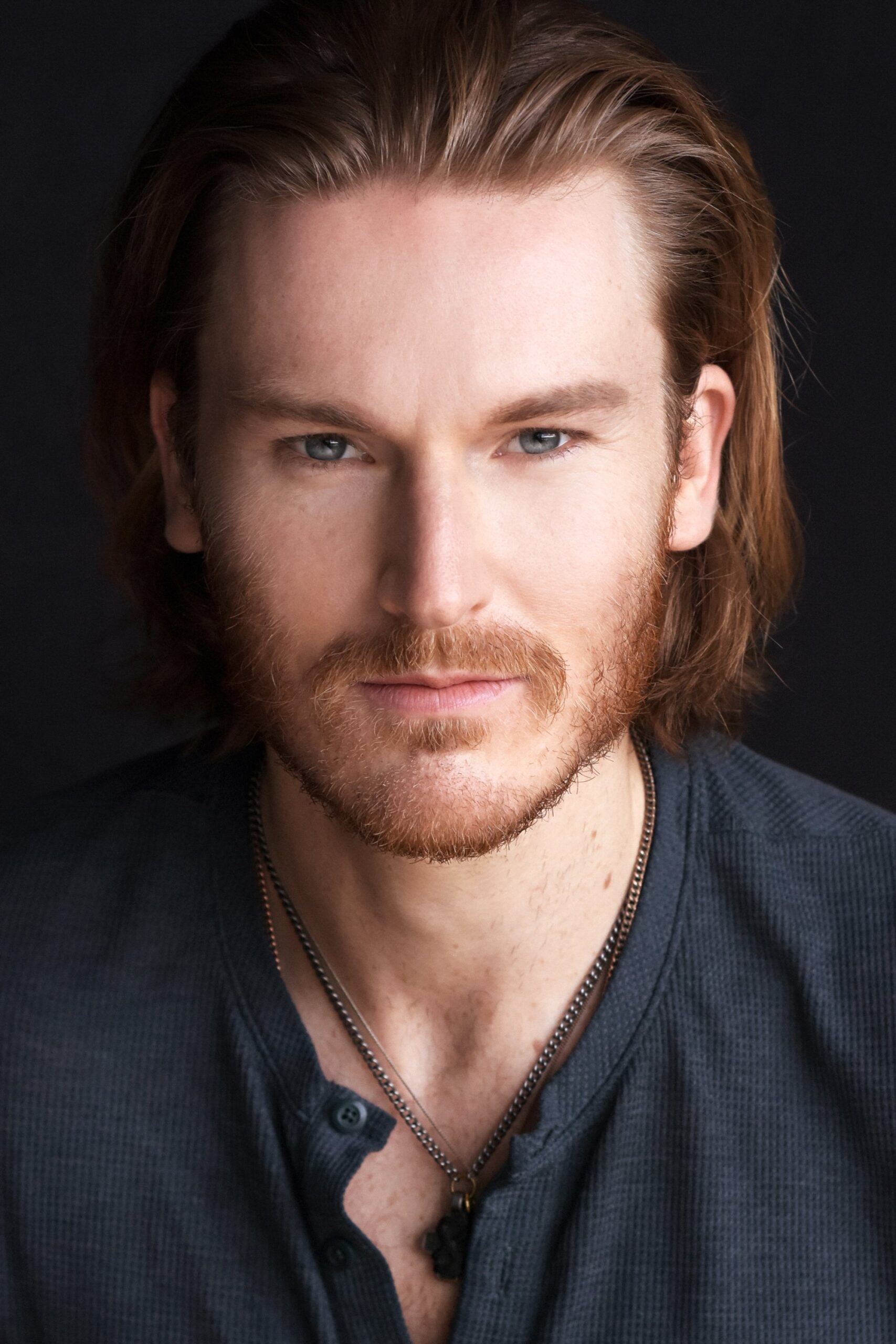 A headshot of Neil Webb.