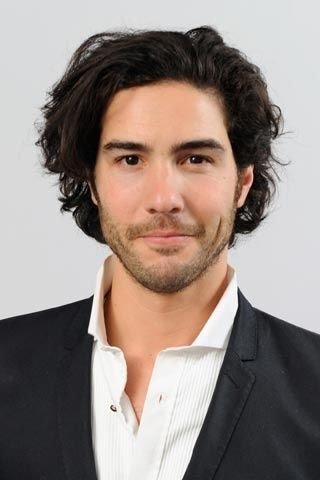 Official headshot photo of person: Tahar Rahim.