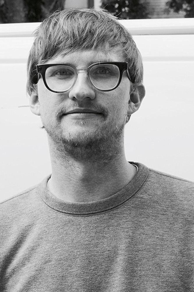 A headshot of Daniel Gray Longino.