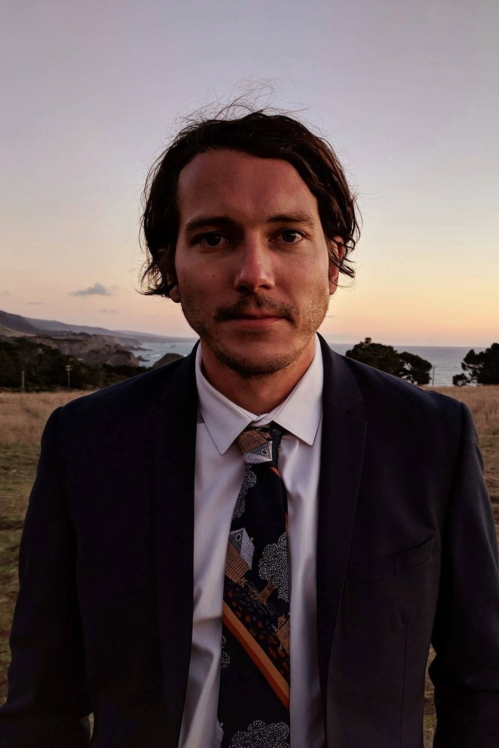 Official headshot photo of person: Joel P. West.